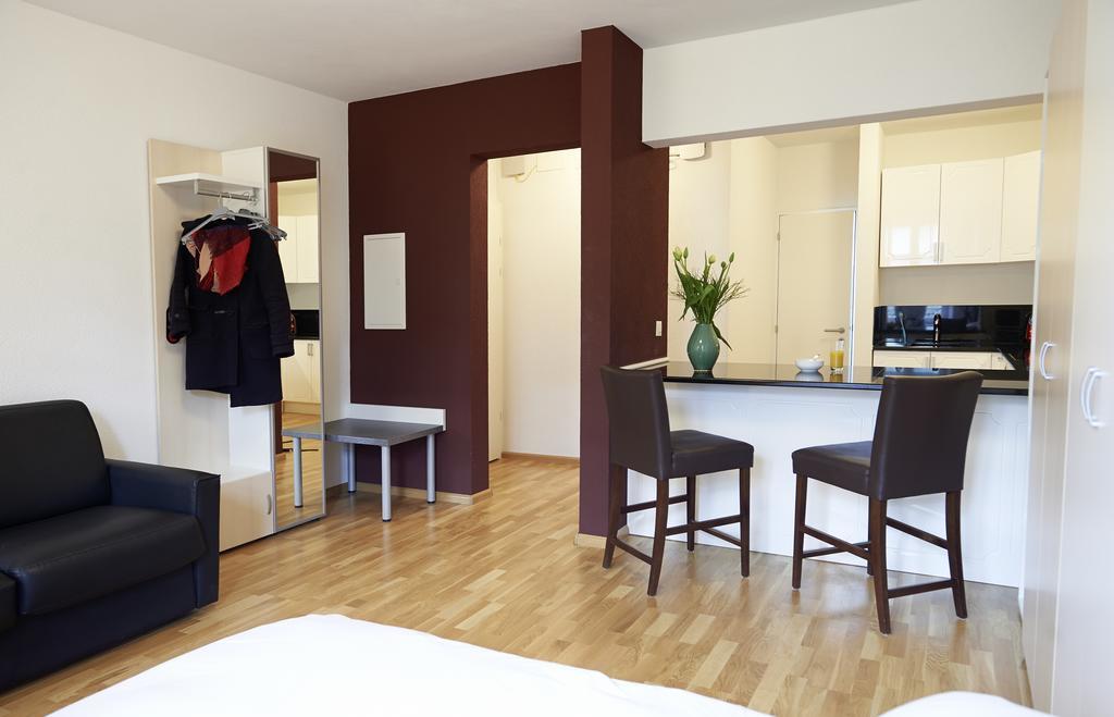 Residence Apartments By Hotel Du Commerce Βασιλεία Δωμάτιο φωτογραφία